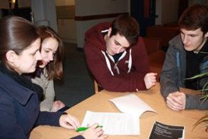 A group of tenants signing a contract